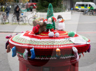 Christmas postbox topper outside Colliers Wood tube station, London, UK. 