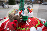 Christmas postbox topper outside Colliers Wood tube station, London, UK. 