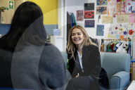 Rita Ora meets with young women who are service users at Solace Women's Aid venue.