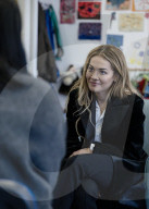 Rita Ora meets with young women who are service users at Solace Women's Aid venue.