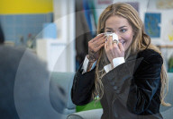 Rita Ora meets with young women who are service users at Solace Women's Aid venue.