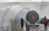 Beach goers in Brighton as Storm Gerrit batters the UK 