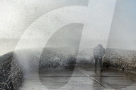 Beach goers in Brighton as Storm Gerrit batters the UK 