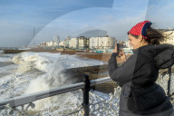 Beach goers in Brighton as Storm Gerrit batters the UK 