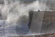 Beach goers in Brighton as Storm Gerrit batters the UK 