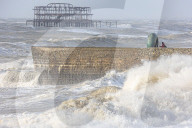 Beach goers in Brighton as Storm Gerrit batters the UK 