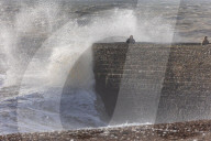 Beach goers in Brighton as Storm Gerrit batters the UK 
