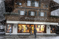 Gstaad's famous luxury boutiques under the snow at the end of 2023. Switzerland.