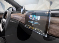 Transparent car infotainment display with Swarovski crystal
