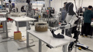 Elon Musk robot shows human like movement in folding a t-shirt