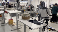 Elon Musk robot shows human like movement in folding a t-shirt