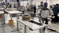 Elon Musk robot shows human like movement in folding a t-shirt