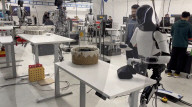 Elon Musk robot shows human like movement in folding a t-shirt