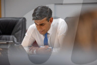 The Prime Minister Rishi Sunak talks to the US President