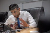 The Prime Minister Rishi Sunak talks to the US President