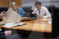 The Prime Minister Rishi Sunak talks to the US President