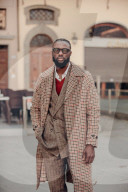 Cosy knits and camo ’fits: street style at Florence fashion week – in pictures