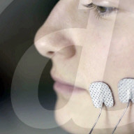 How an induced smile could help treat depression