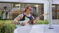 Wide awake guitarist strums his way through brain surgery