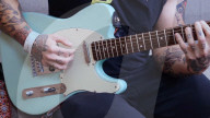 Wide awake guitarist strums his way through brain surgery