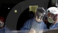 Wide awake guitarist strums his way through brain surgery