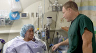 Wide awake guitarist strums his way through brain surgery