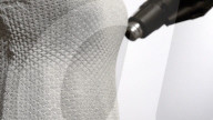 Dress can change style and fit with blow of a heat gun