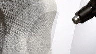 Dress can change style and fit with blow of a heat gun