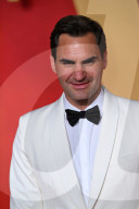 PEOPLE - Oscars 2024: Roger Federer und Frau Mirka strahlen auf dem roten Teppich