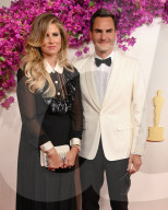 PEOPLE - Oscars 2024: Roger Federer und Frau Mirka strahlen auf dem roten Teppich