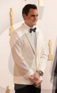 PEOPLE - Oscars 2024: Roger Federer und Frau Mirka strahlen auf dem roten Teppich