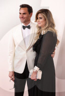 PEOPLE - Oscars 2024: Roger Federer und Frau Mirka strahlen auf dem roten Teppich