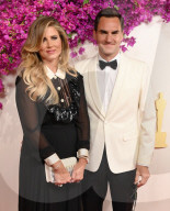 PEOPLE - Oscars 2024: Roger Federer und Frau Mirka strahlen auf dem roten Teppich