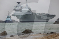 HMS Queen Elizabeth leaves Portsmouth, UK.