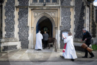 Palm Sunday service at St Mary's Church Wimbledon Village, London, UK. 