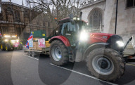 British farmers drove tractors to the Houses of Parliament, Westminster, London, UK.