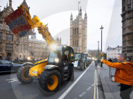 British farmers drove tractors to the Houses of Parliament, Westminster, London, UK.