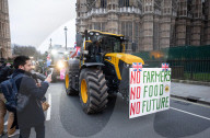 British farmers drove tractors to the Houses of Parliament, Westminster, London, UK.