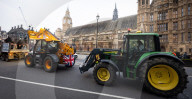 British farmers drove tractors to the Houses of Parliament, Westminster, London, UK.