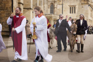Donkeys lead the clergy and choir in procession into York Minster for the Palm Sunday Eucharist