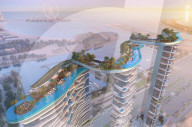 Luxury apartment towers linked by infinity pools