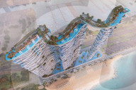 Luxury apartment towers linked by infinity pools