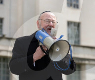 The Empty Seder Table Installation "Bring Them Home Now" event at Richmond Terrace, Whitehall, London, UK.