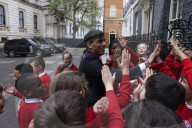 Prime Minister Rishi Sunak greets school children