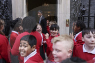 Prime Minister Rishi Sunak greets school children