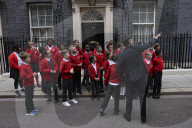 Prime Minister Rishi Sunak greets school children