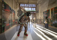 A lost astronaut, looted treasure and a hit naked Turk: the 60th Venice Biennale - in pictures