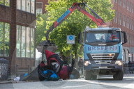 Dublin sends in police and buses to dismantle tent city