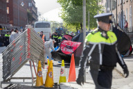 Dublin sends in police and buses to dismantle tent city
