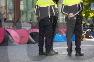 Dublin sends in police and buses to dismantle tent city